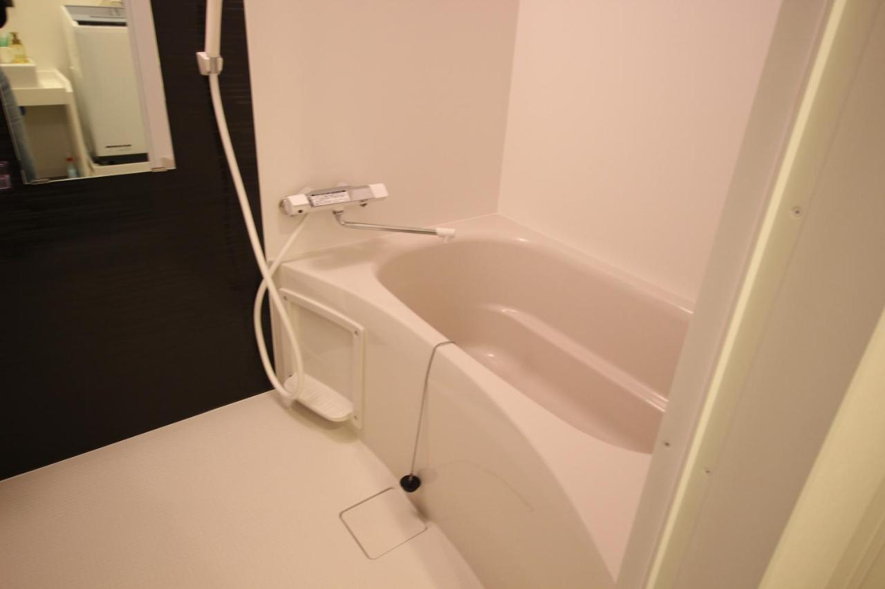 Namba West Saika Apartment Osaka Exterior photo